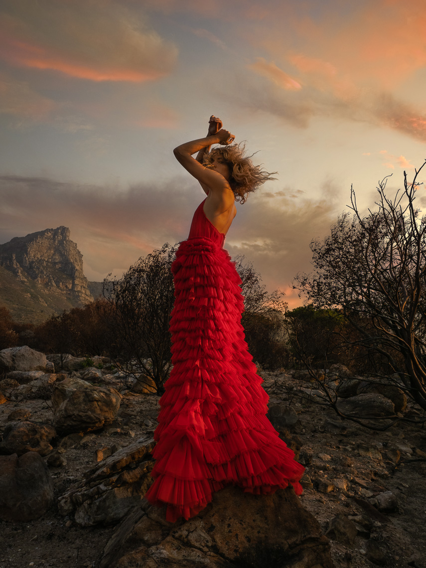 Fashion model in red couture dress photograph by marc rogoff